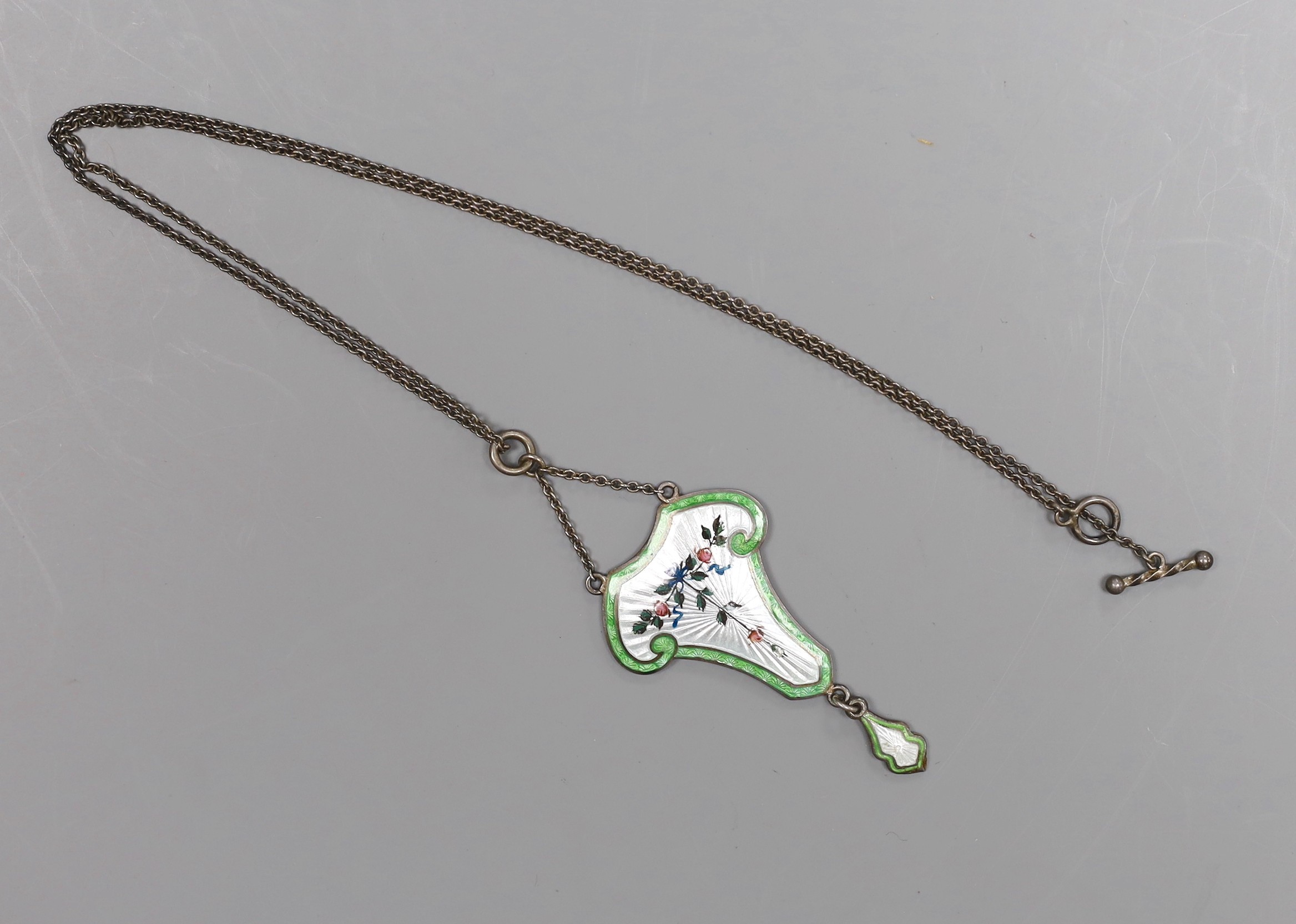 A George V enamelled silver drop pendant, 4.75cm, on original fine chain, hallmarked Birmingham 1912